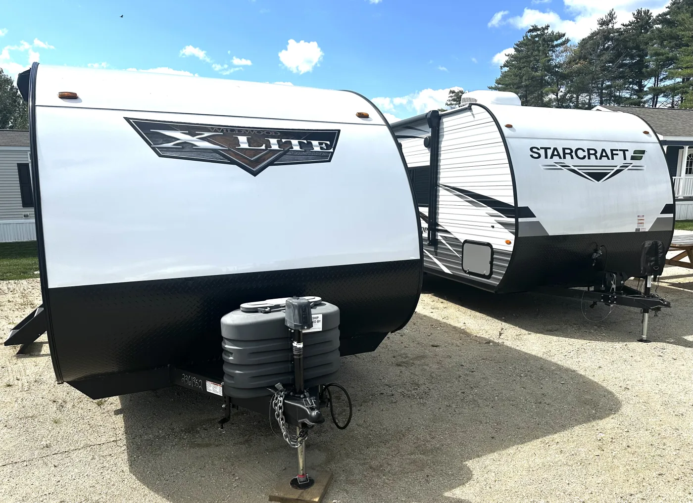 Row of consigned travel trailers on the lot in Gray, Maine